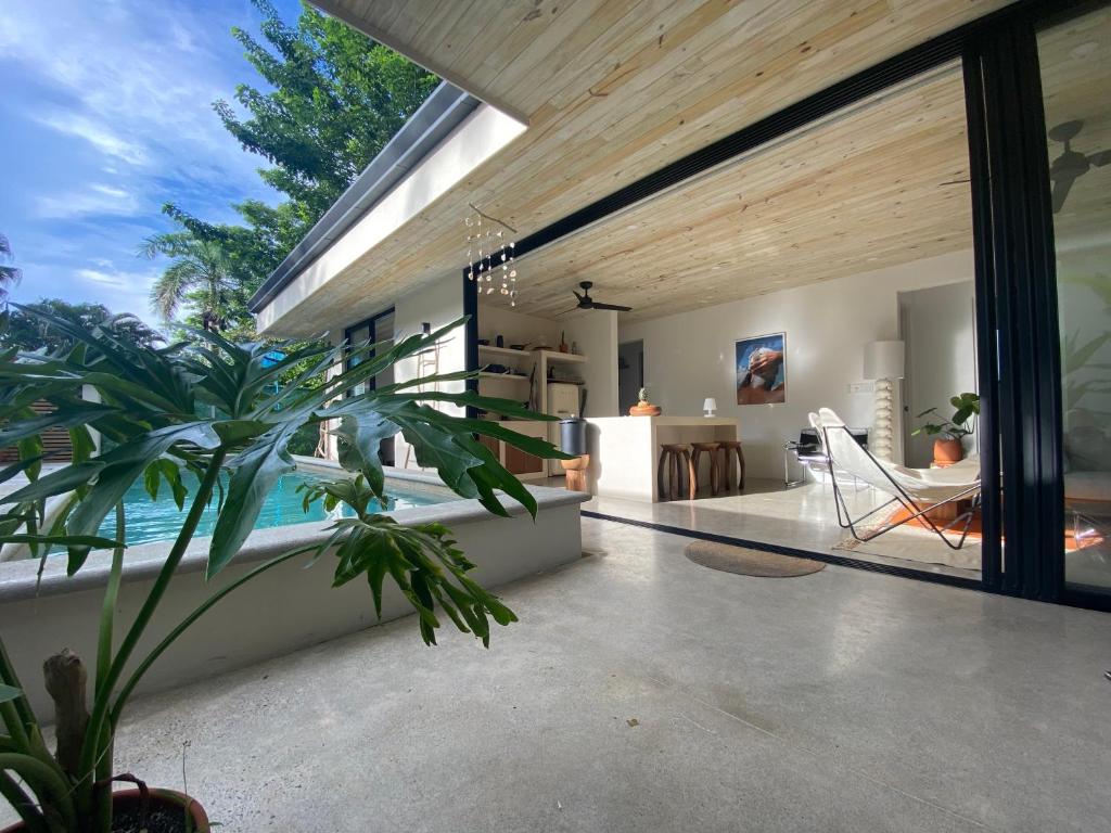 Casa Remy - Walk to the Beach and stay in a private compound! Pool, Kitchen, AC, Wi-Fi